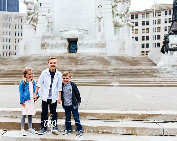 Children standing on steps in front of Soldiers and Sailors Monument in Indianapolis IN
