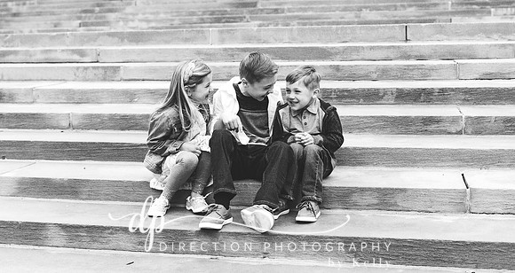 Children sitting on steps in front of Soldiers and Sailors Monument in Indianapolis IN