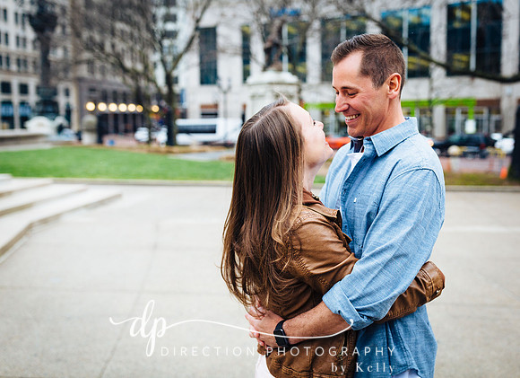 Attractive couple embracing in downtown Indianapolis IN